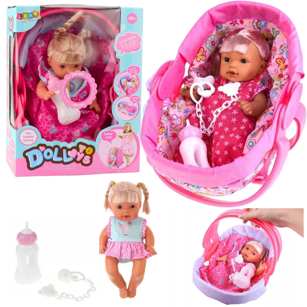 Lalka bobas w różowym nosidełku z kołderką i smoczkiem