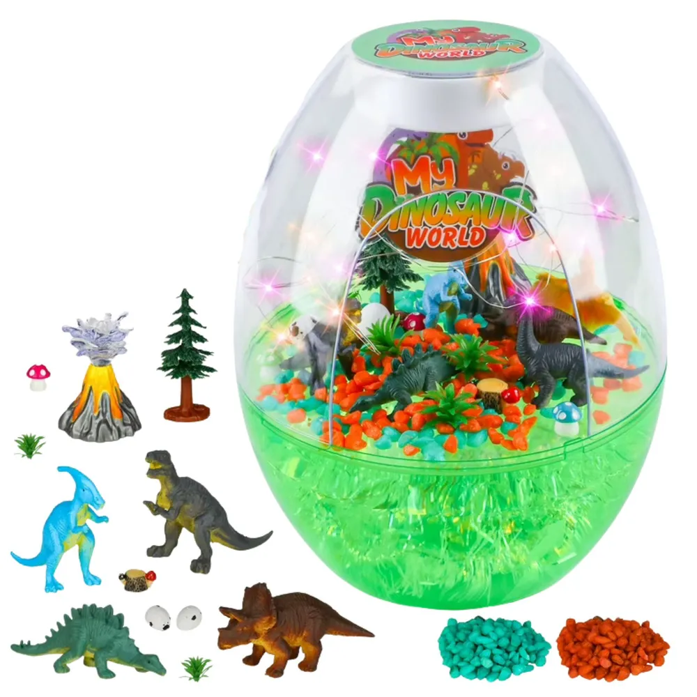 zbliżenie na figurki dinozaurów w kolorowym terrarium