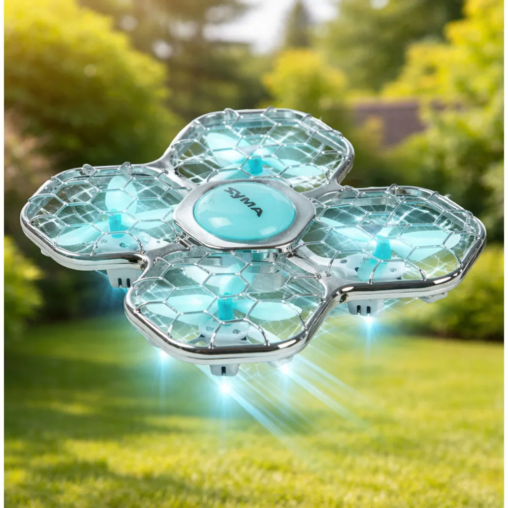 Dron Syma X26 PRO na tle srebrno-niebiesko-białym