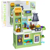 zielona kuchnia zabawkowa dla dzieci z 64 elementami na tle jasnego pokoju