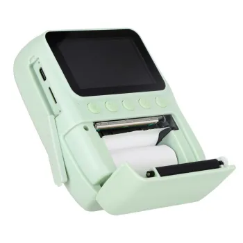 aparat z gotową, wydrukowaną fotografią obok