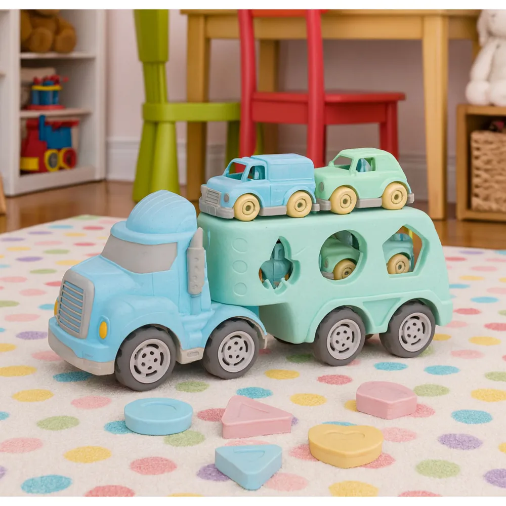 małe pastelowe autka umieszczone na górze transportera