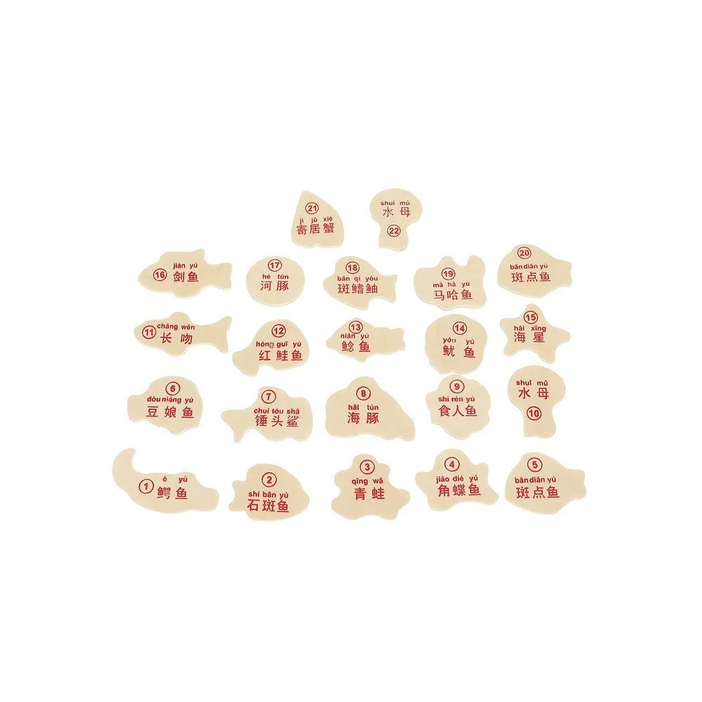 wszystkie 22 drewniane rybki rozłożone obok siebie na tle gry