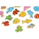 zestaw łowienie rybek ułożony do zabawy na jasnym stole