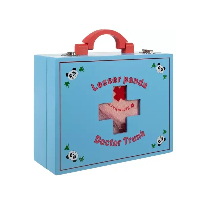 drewniane narzędzia dentysty i lekarza rozłożone obok walizki