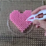 Magnesy i breloczki dołączone do zestawu XXL