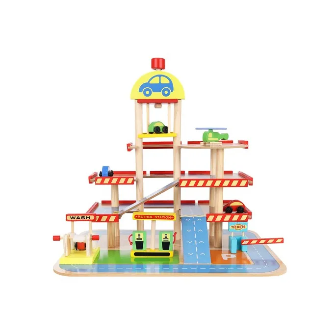 elementy zestawu parkingu: samochodziki i akcesoria rozłożone obok