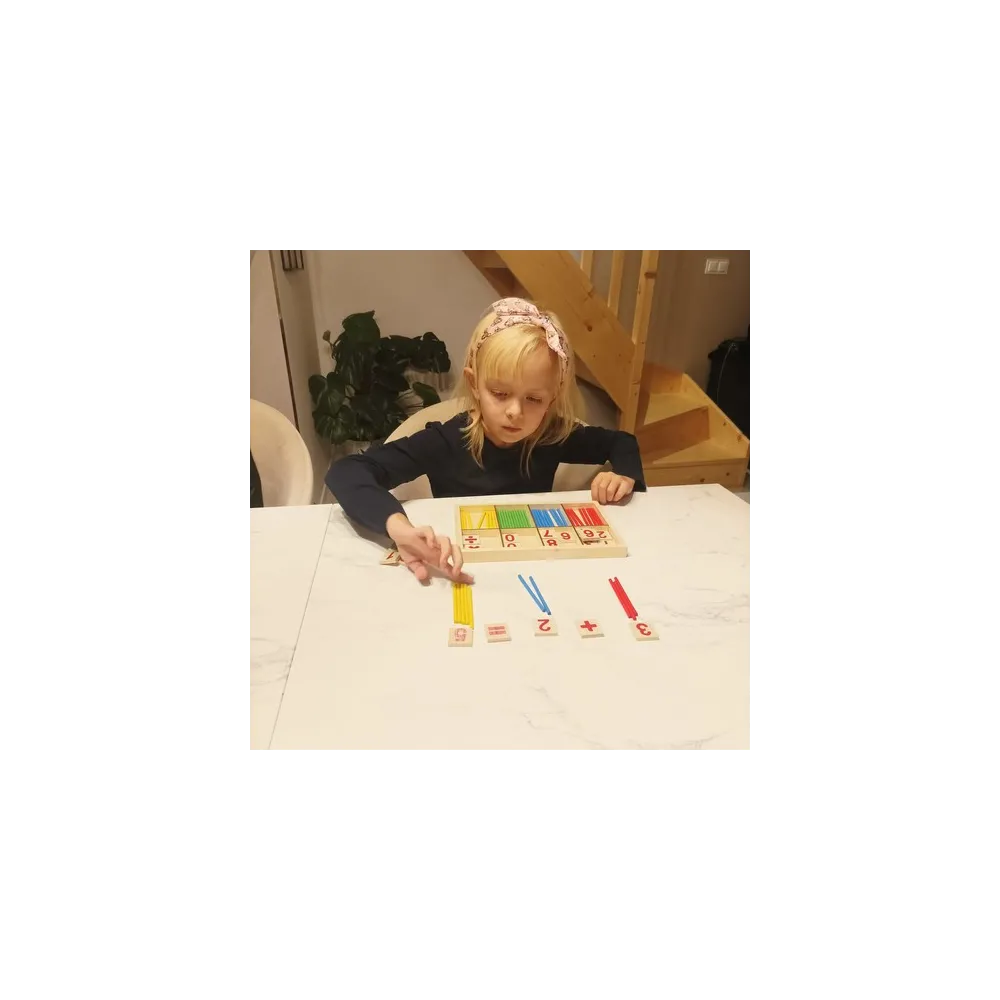 patyczki do liczenia ułożone w tęczowe kolory