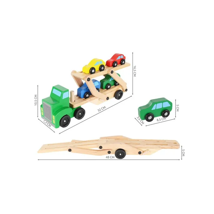 widok zestawu tir z lawetą i autkami rozłożonymi obok siebie