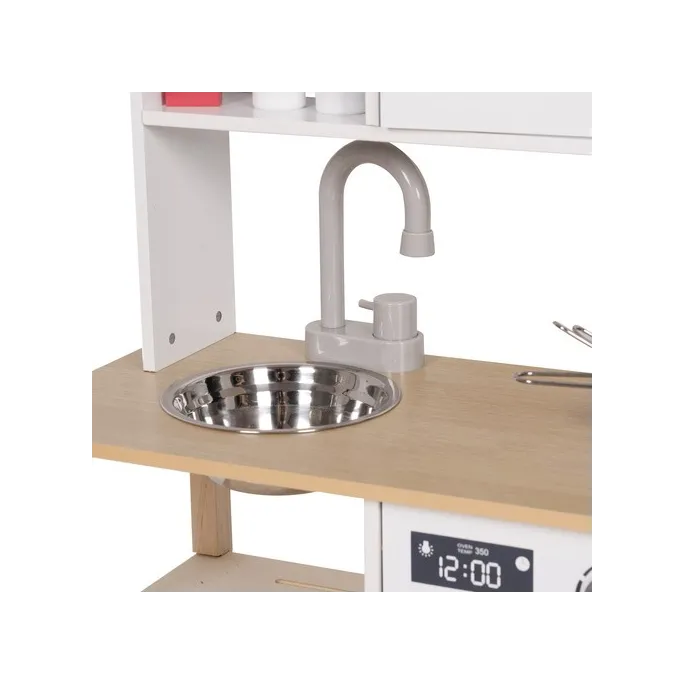 detal zegara z ruchomymi wskazówkami na kuchni