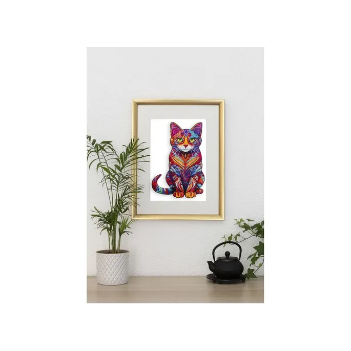 Puzzle o nieregularnym kształcie kota na jasnym tle