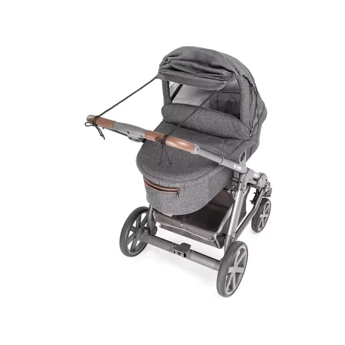 Fragment daszka prezentujący sposób mocowania do stelaża wózka