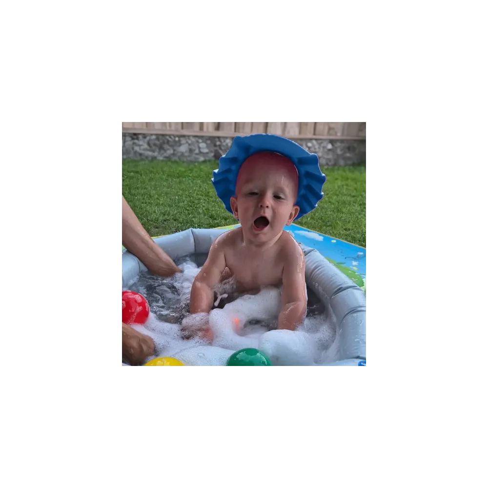 Niebieskie rondo kąpielowe dla dzieci leżące płasko na powierzchni