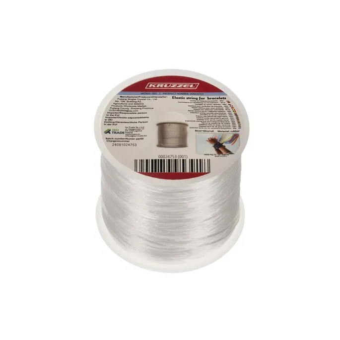 detal grubości gumki do biżuterii na białej szpulce