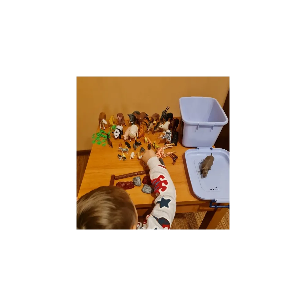 brązowy karton transportowy do zestawu figurek zwierząt kruzzel