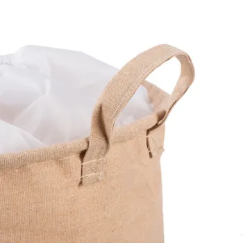 Beżowy materiał z nadrukiem prezentujący teksturę lnu i bawełny