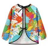 kolorowe detale nadruku na fartuchu ochronnym dla dzieci kruzzel