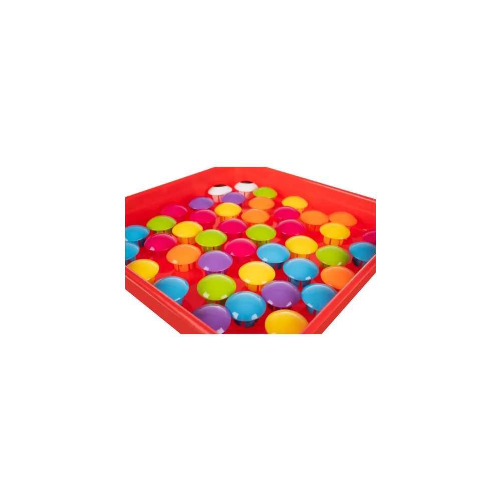 wielokolorowa mozaika ułożona przez dziecko na białej planszy