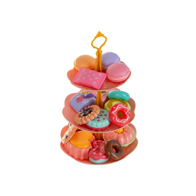 aranżacja stołu do herbaty z cukierkami, makaronikami i pączkami