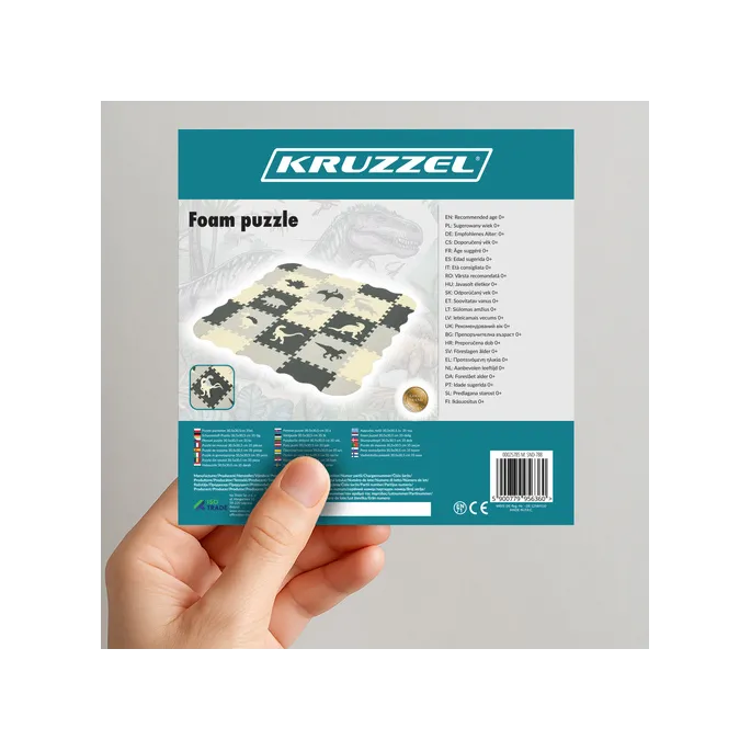 Zbliżenie na kolorowe elementy puzzli z dinozaurami