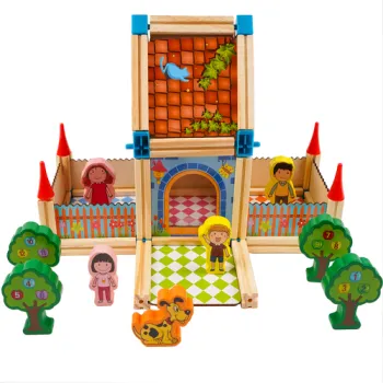 Dziecko budujące domek z klocków Kruzzel na podłodze