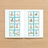 Instrukcja obsługi oraz wybrane klocki konstrukcyjne obok siebie