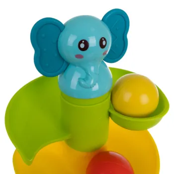 Widok wieży z piłeczkami w trakcie zabawy z dzieckiem