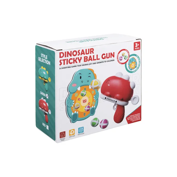 pistolet w kształcie dinozaura z kolorowymi piłeczkami na stole