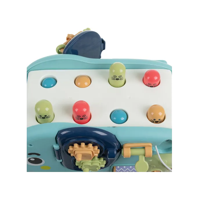 instrukcja w kilku językach obok zabawki sensorycznej