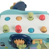 instrukcja w kilku językach obok zabawki sensorycznej