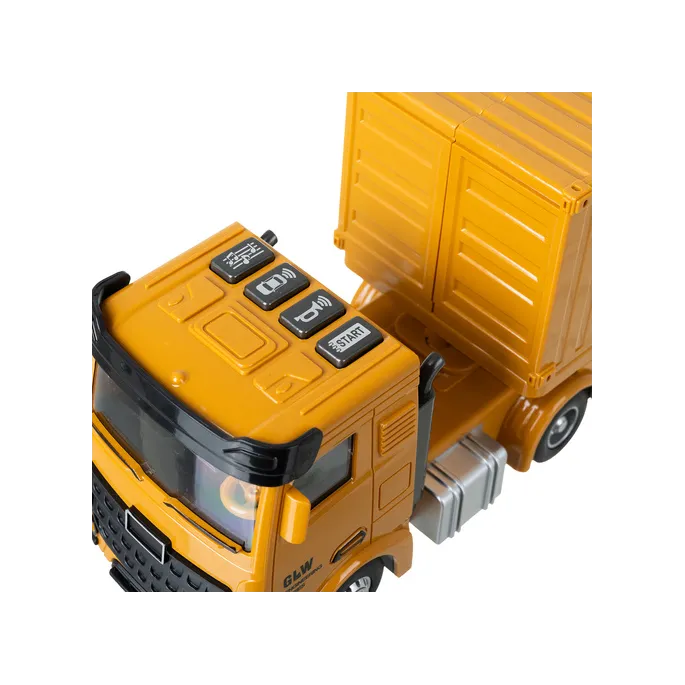 różnorodne pojazdy i akcesoria na tle rozłożonego kompletu