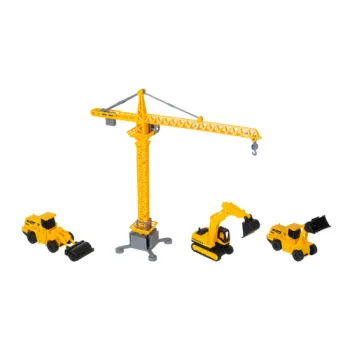 szpatułki do modelowania leżące przy piasku i miniaturkach pojazdów