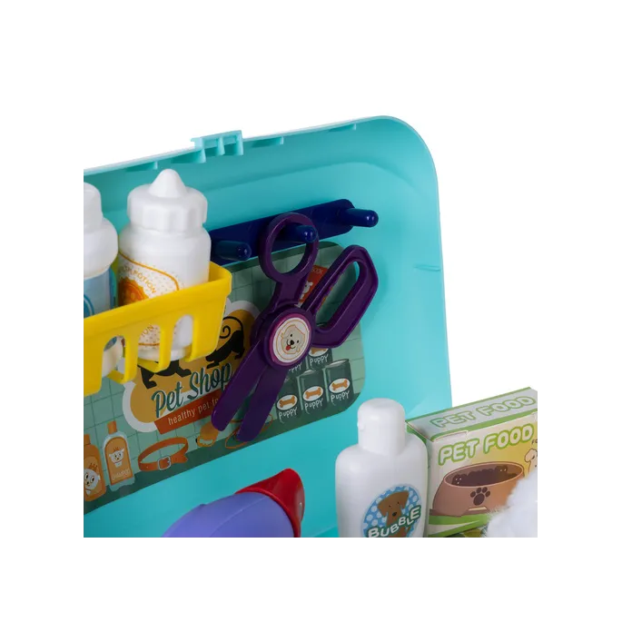 miękki, beżowy piesek pluszowy z zestawu kąpielowego do zabawy