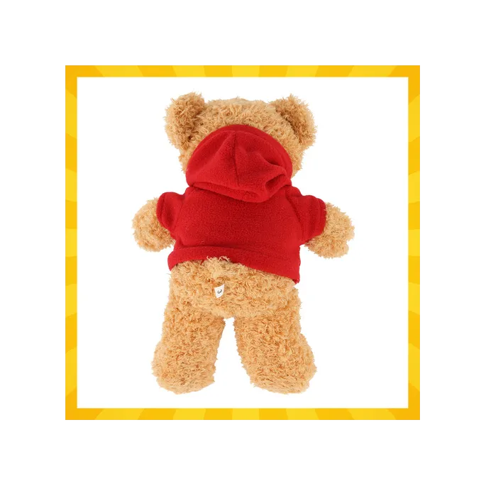 miś pluszowy kruzzel leżący w łóżeczku dziecka