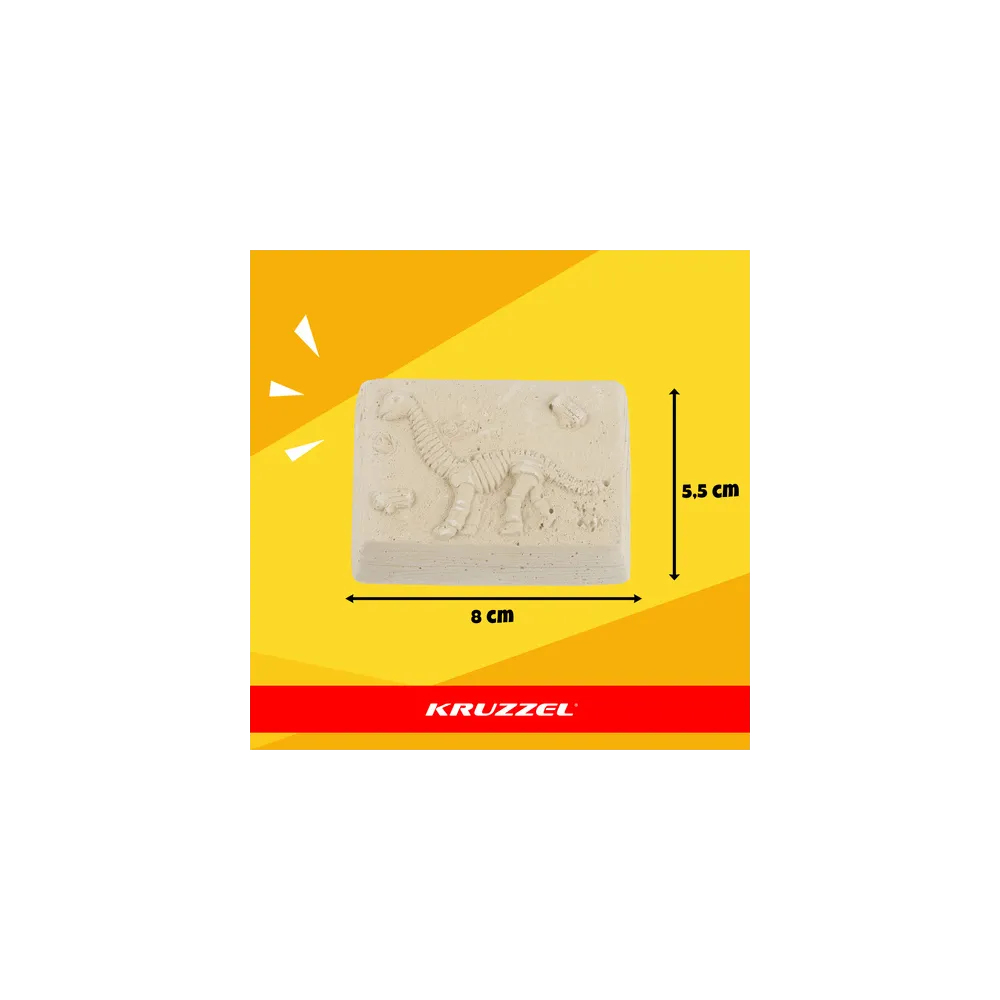 wszystkie elementy zestawu wykopalisk dinozaurów rozłożone na stole