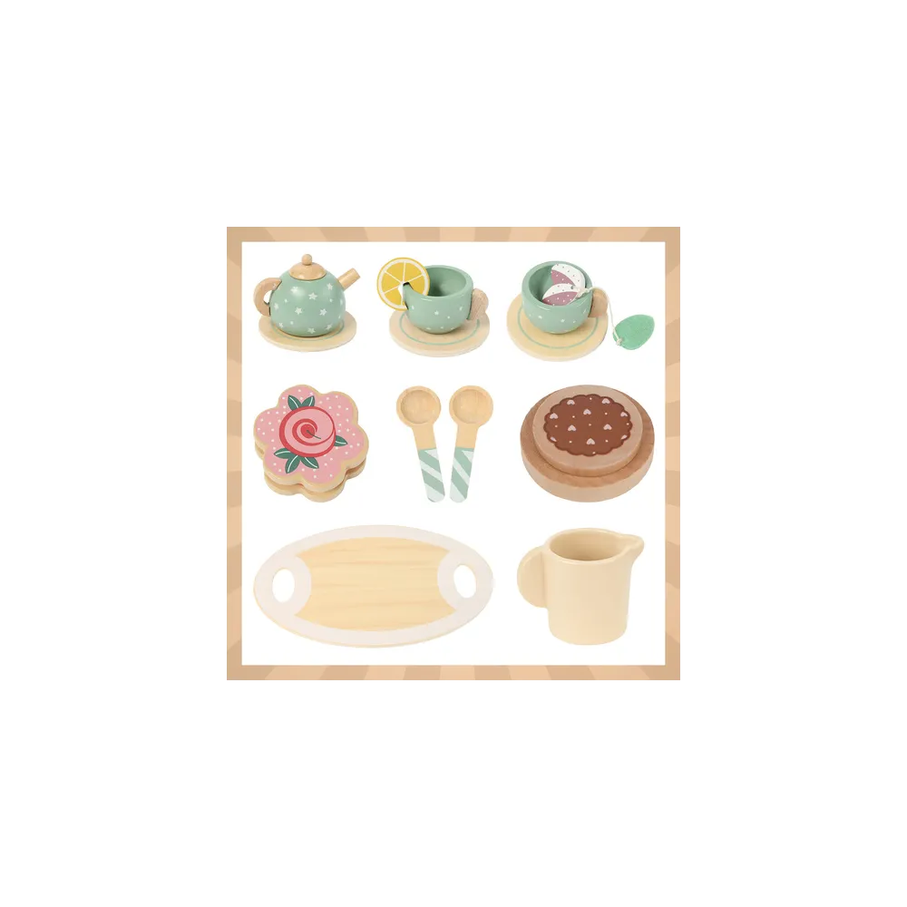 Zbliżenie na zieloną filiżankę ze spodkiem i łyżeczką z drewna