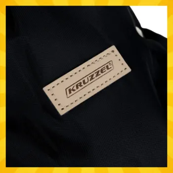 Mufki Kruzzel z widocznym zapięciem na napy do łatwego montażu