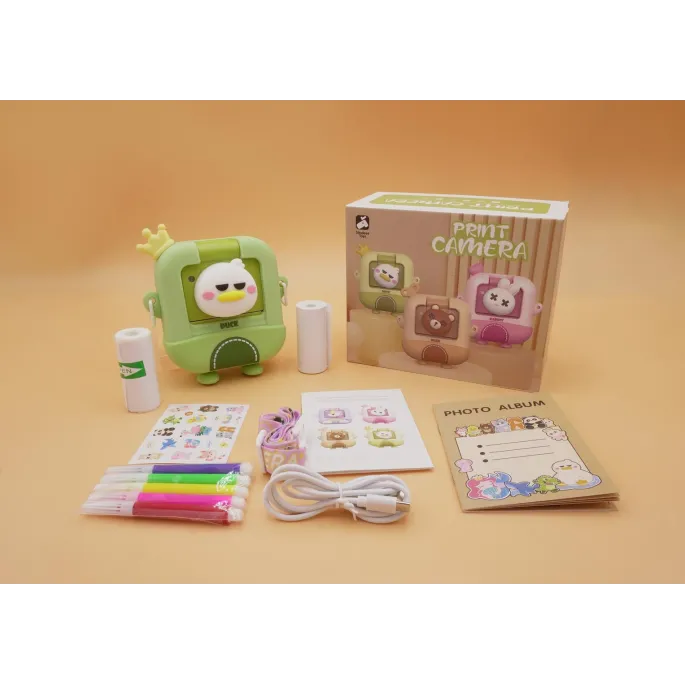 aparat fotograficzny z funkcją drukowania w kształcie kaczki na białym tle