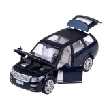 Granatowe autko z otwartymi drzwiami od strony kierowcy