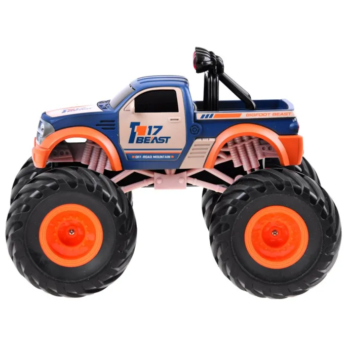 Autko Monster Truck podczas jazdy po nierównej nawierzchni