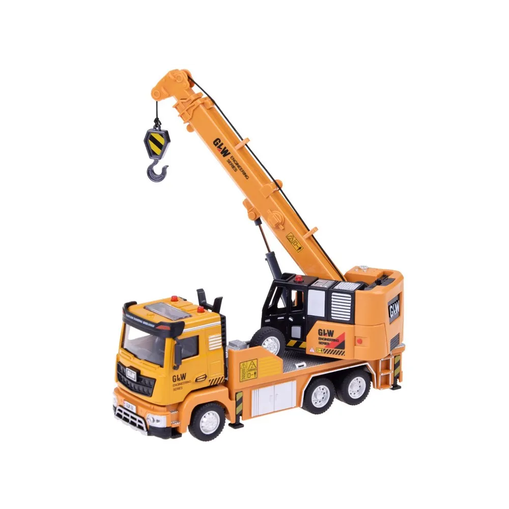 żółty dźwig zabawkowy na podłożu do zabawy