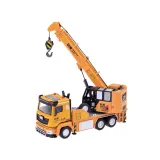 żółty dźwig zabawkowy na podłożu do zabawy