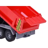 Pojazd z efektem dźwiękowym obok opakowania