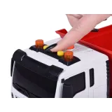 Widok z boku na biało-czerwoną wywrotkę dziecięcą