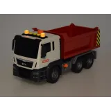 Zabawka wywrotka na kolorowym placu budowy w pokoju