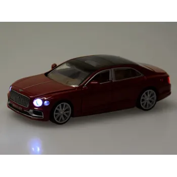 Bordowy Bentley Flying Spur Hybrid w dynamicznej pozie jazdy