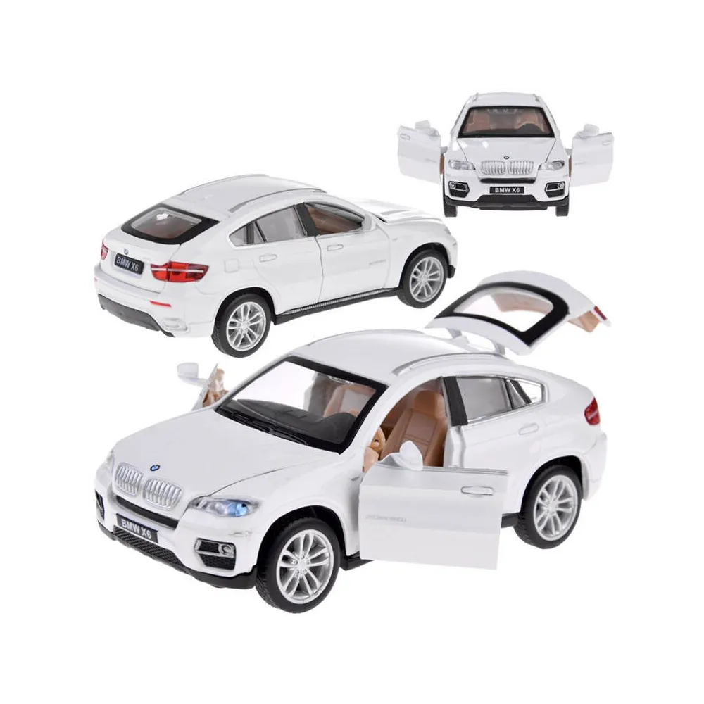 Biała miniatura BMW X6 metalowa widok z boku na tle jasnego tła
