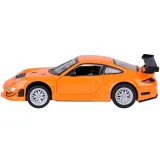 Pomarańczowy model Porsche 911 GT3 RSR na tle białej powierzchni