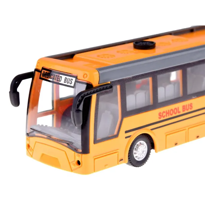 pudełko z zestawem: autobus, pilot, akumulator i ładowarka USB