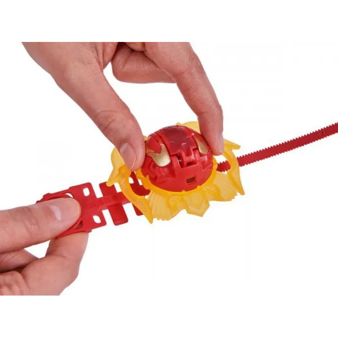 Figurka Attack Mantida Bakugan umieszczona przy pojemniku kolekcjonerskim